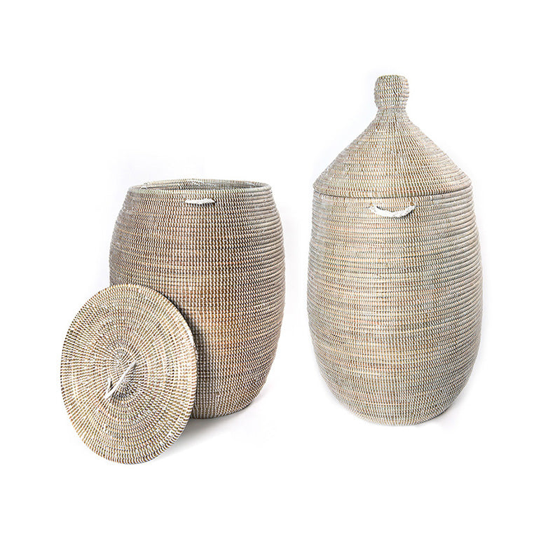 Dou Bou Ndaw baskets. Tall, white, rounded, baskets with handles. One has a lid with a peak the other a flat lid.