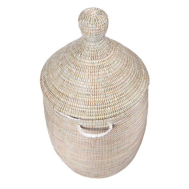 Dou Bou Ndaw basket. Tall, white, rounded, basket with handles and a peak lid. View from the top.